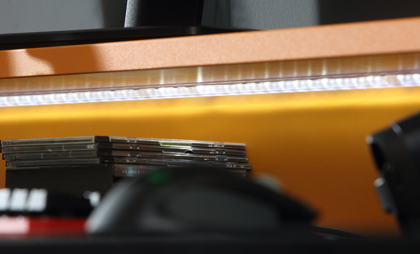 tezaur black/orange gaming desk with colour changing led
